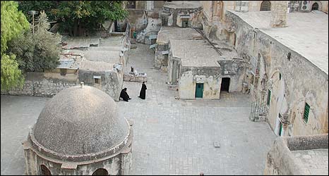 The stone huts of Deir al Sultan monastery